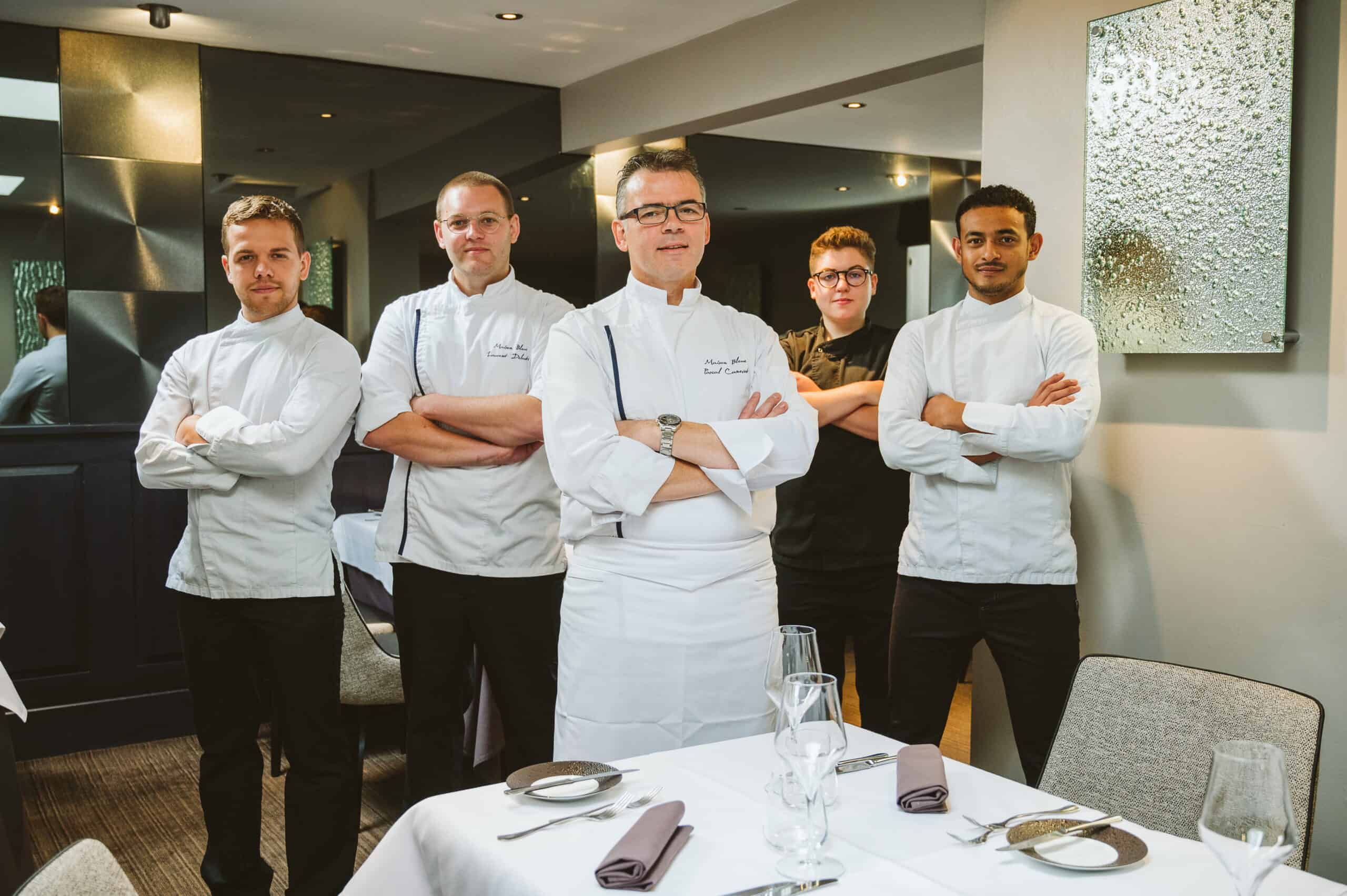 Kitchen staff at Maison Bleue Restaurant